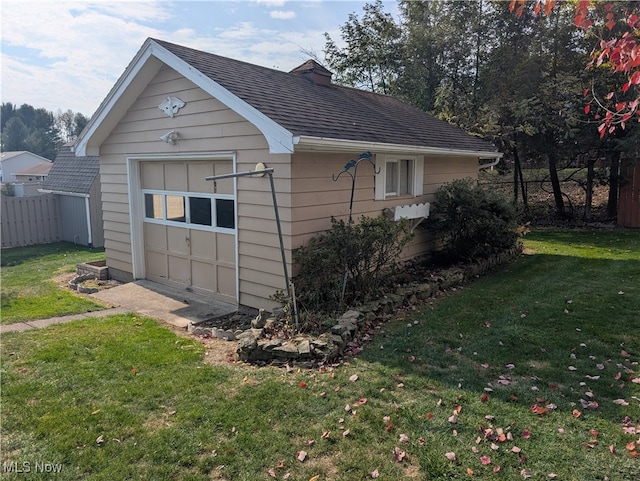 view of outdoor structure featuring a yard