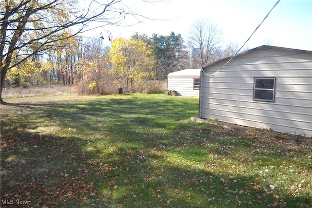 view of yard with a carport