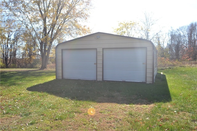 garage with a lawn