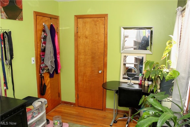 office area with light hardwood / wood-style flooring