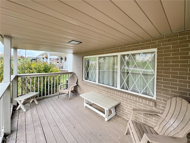 wooden deck with a porch