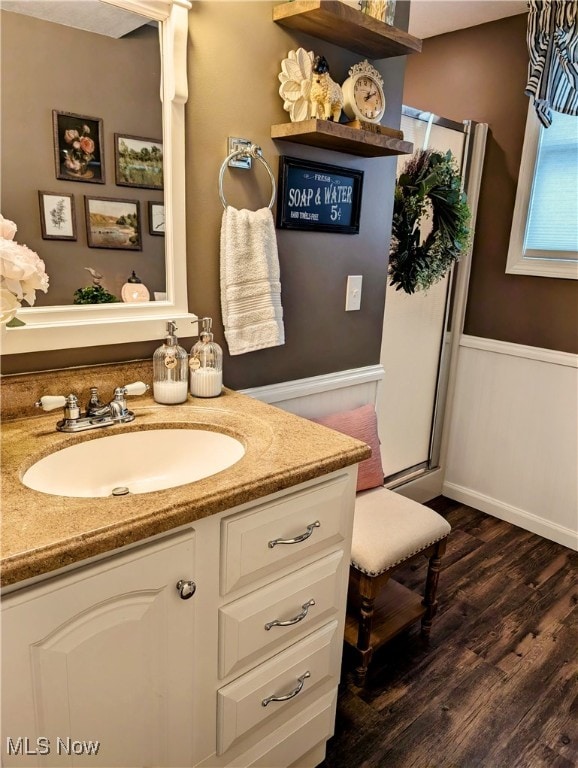 bathroom featuring vanity and wood-type flooring