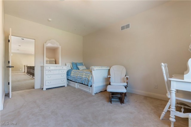 bedroom with baseboards, visible vents, and carpet floors