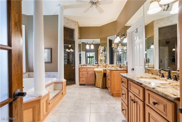 bathroom featuring vanity, ceiling fan with notable chandelier, decorative columns, and independent shower and bath