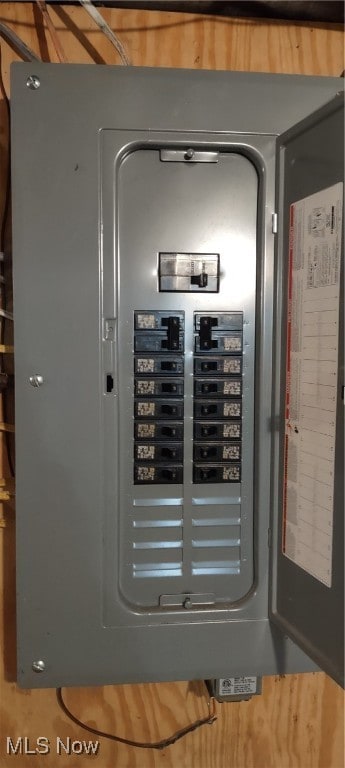 utility room featuring electric panel