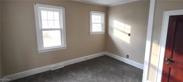 2322 Walnut Blvd, Ashtabula, OH 44004 - spare room featuring baseboards and dark carpet
