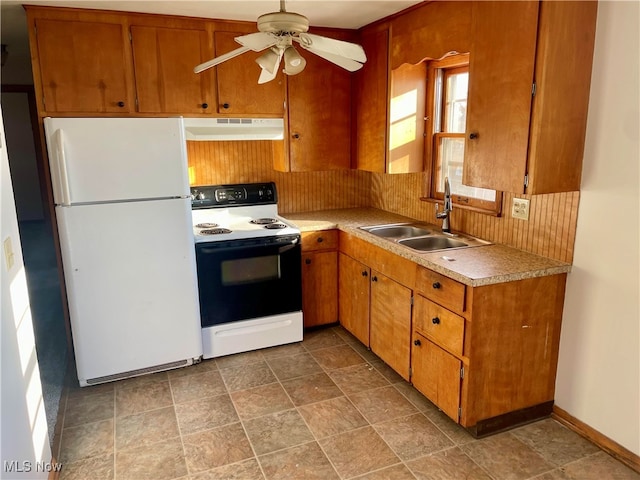 kitchen with ceiling fan, sink, and white appliances