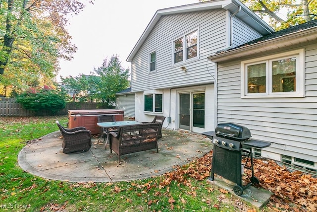 view of patio featuring area for grilling and a hot tub