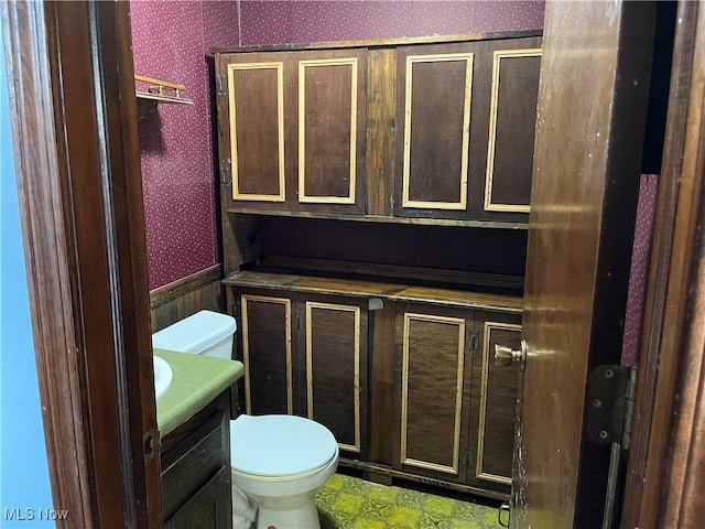 bathroom with vanity and toilet