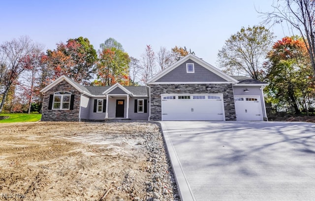 craftsman inspired home featuring a garage