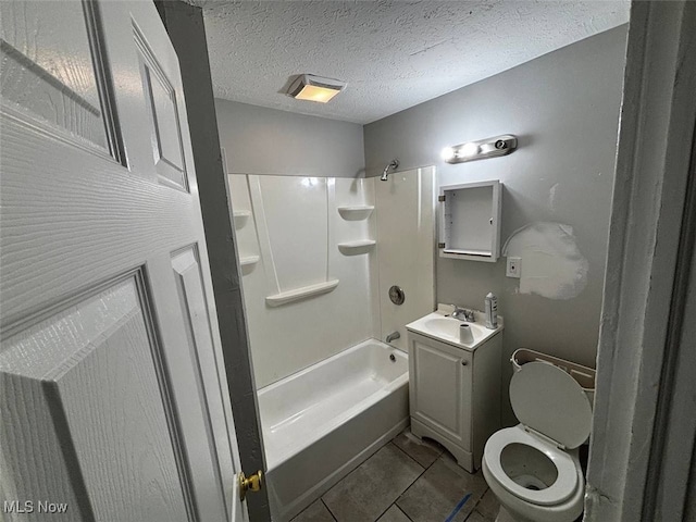 full bathroom featuring bathtub / shower combination, a textured ceiling, vanity, tile patterned flooring, and toilet