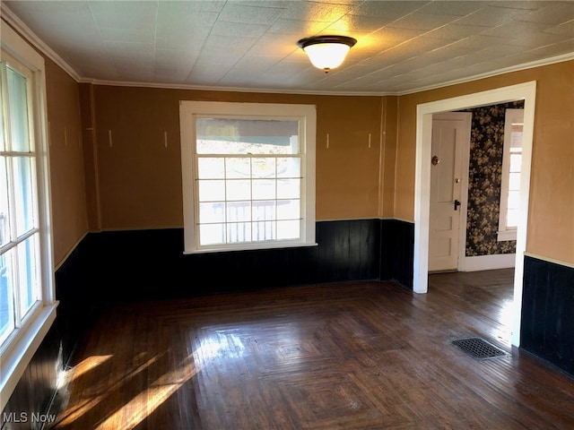 spare room with crown molding