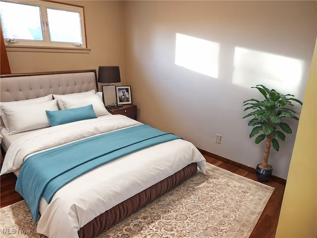 bedroom featuring hardwood / wood-style floors