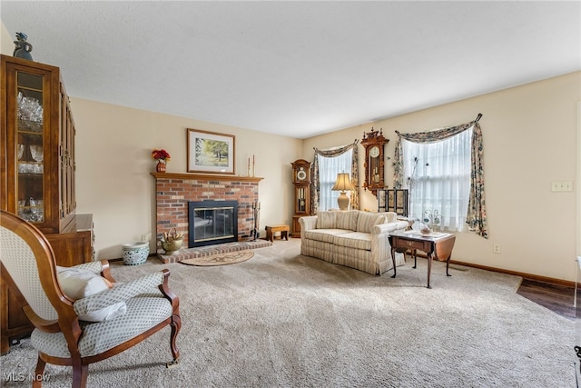 carpeted living room with a fireplace