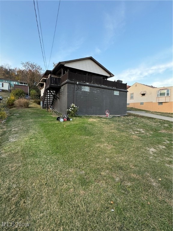 view of property exterior featuring a yard