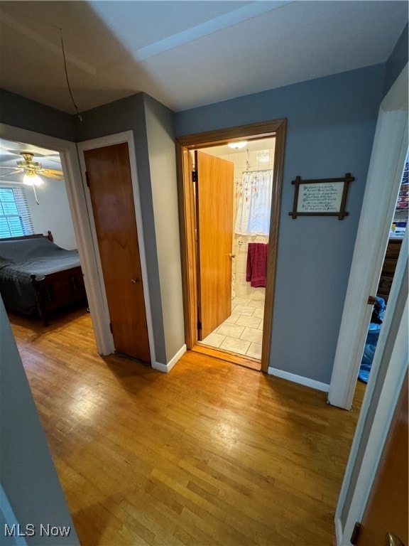 hallway featuring light hardwood / wood-style flooring