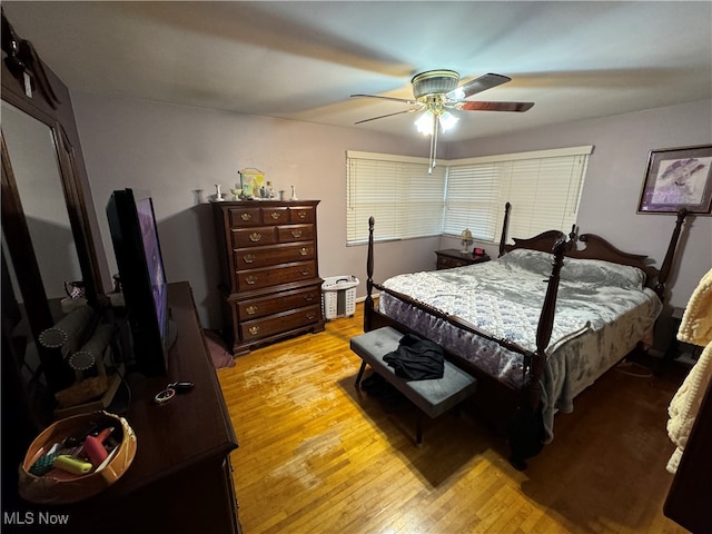 bedroom featuring ceiling fan and light hardwood / wood-style floors