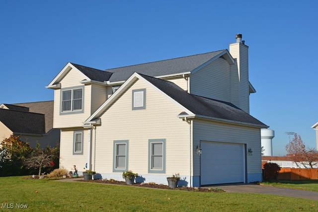 exterior space with a garage and a front yard