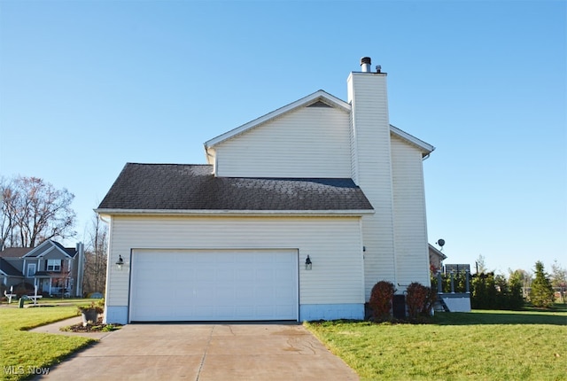 exterior space featuring a garage and a lawn