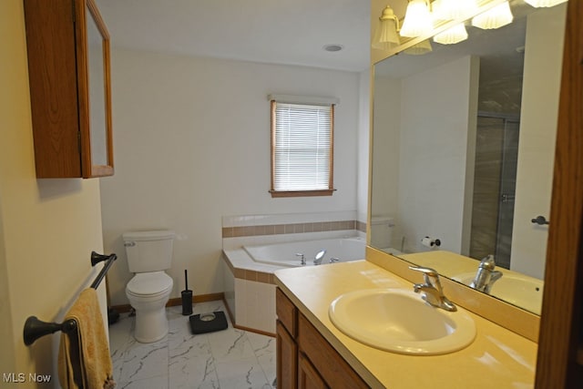 full bathroom with vanity, separate shower and tub, and toilet