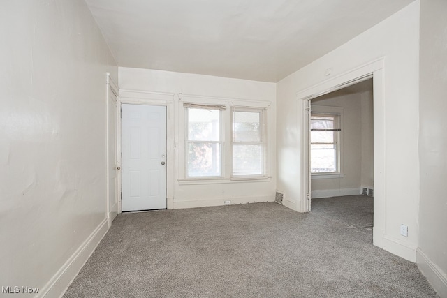 view of carpeted spare room