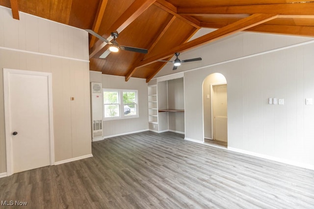 unfurnished living room with built in shelves, hardwood / wood-style floors, beamed ceiling, and wooden ceiling