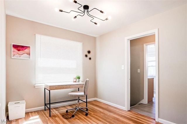 office space with hardwood / wood-style flooring