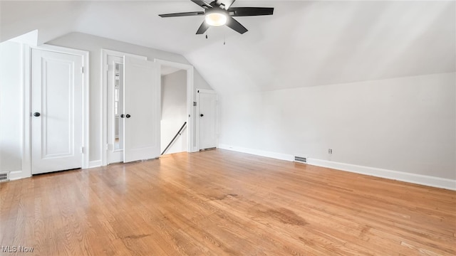 bonus room featuring vaulted ceiling, ceiling fan, and light hardwood / wood-style flooring