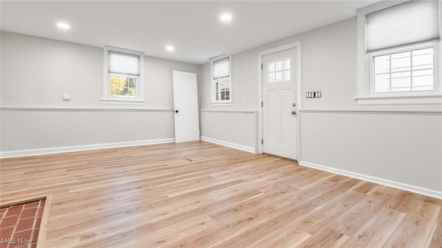 foyer with light wood-type flooring