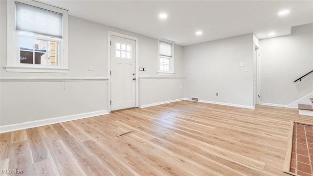 entrance foyer with light wood-type flooring