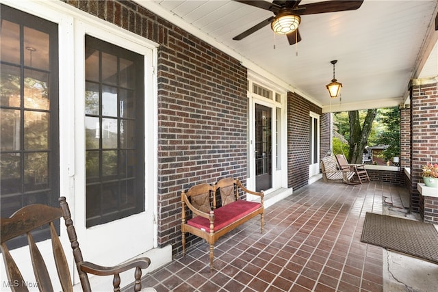 view of patio / terrace with ceiling fan and a porch