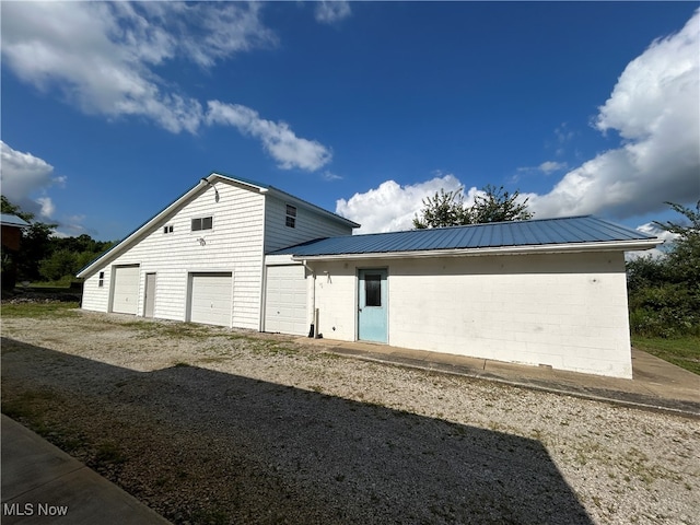 exterior space with a garage