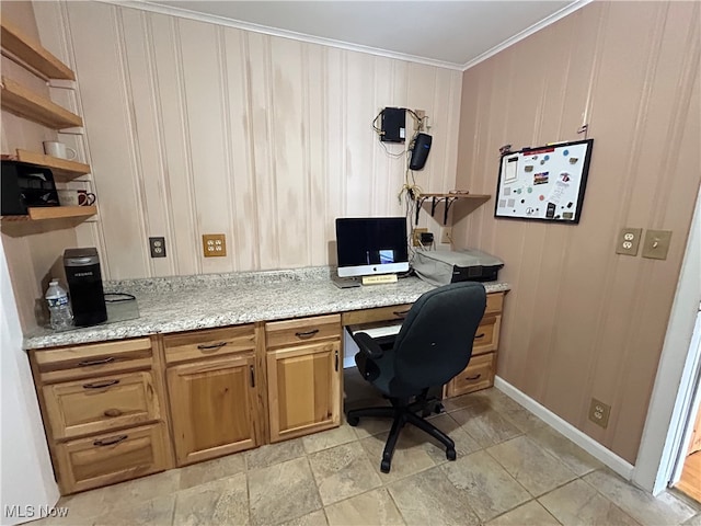 office featuring built in desk and ornamental molding