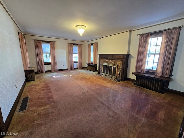 unfurnished living room with carpet floors