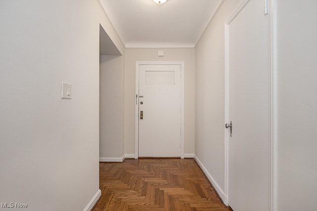 corridor with dark parquet flooring