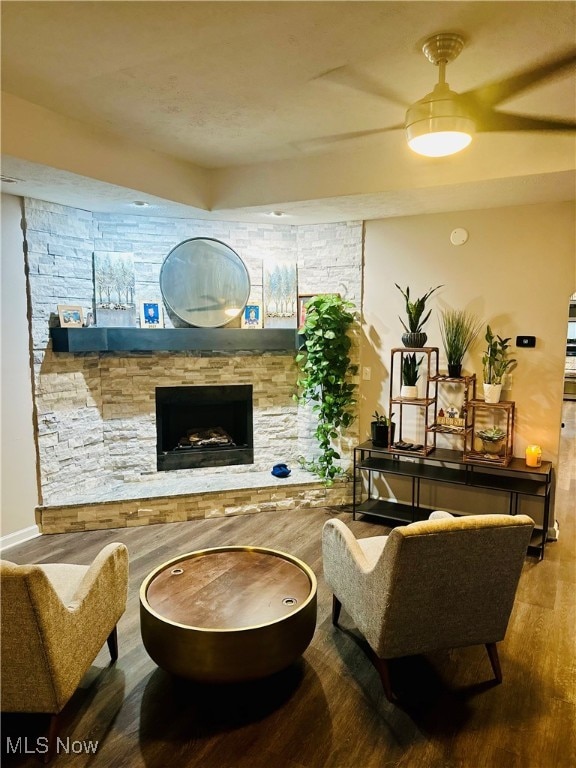 interior space featuring a fireplace and wood-type flooring