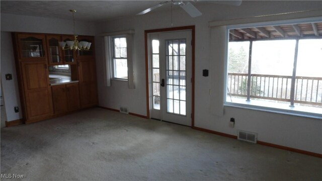 130 Clearview Ave, Weirton, WV 26062 - entryway with plenty of natural light, a ceiling fan, a chandelier, and light carpet