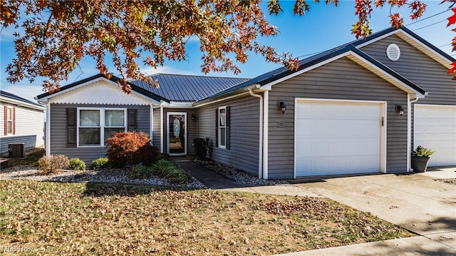 single story home featuring a garage