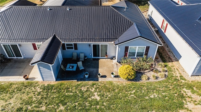 exterior space featuring a patio and a yard