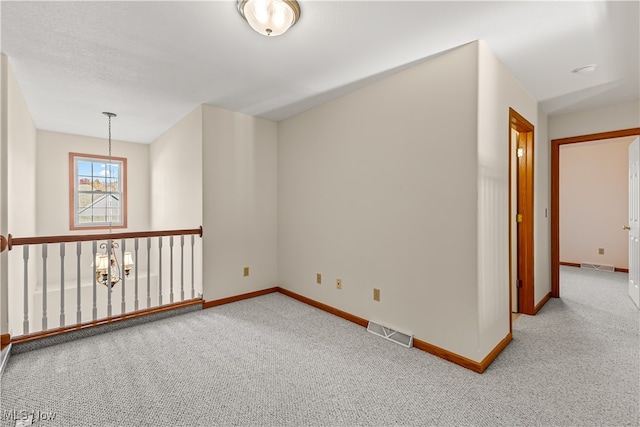 unfurnished room with carpet floors