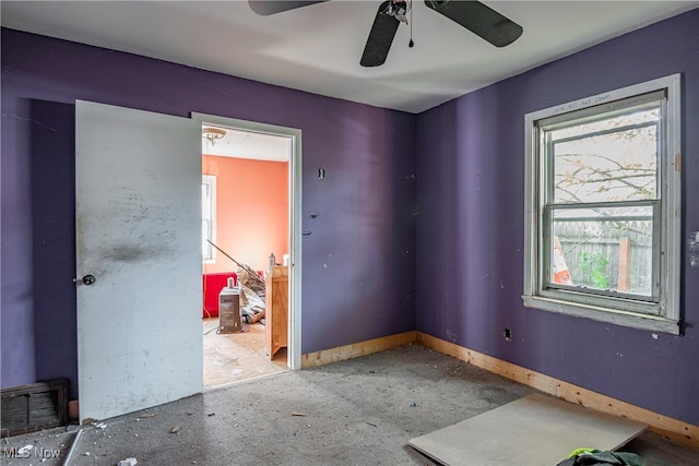 unfurnished room with ceiling fan