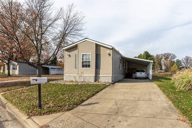 view of front of home with a carport