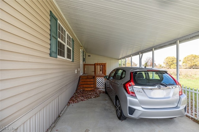 view of parking featuring a carport