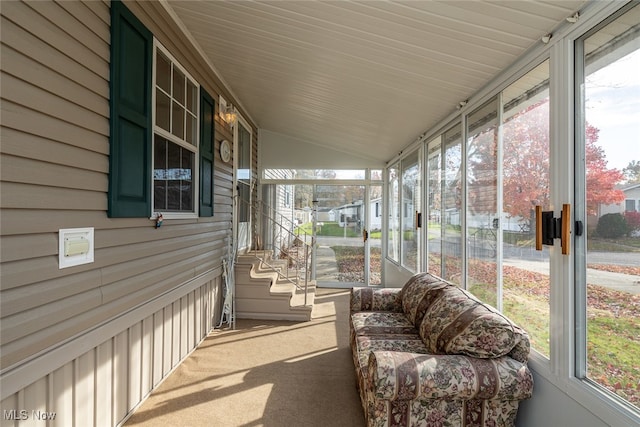 sunroom with vaulted ceiling