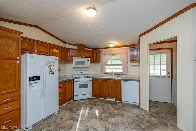 kitchen featuring lofted ceiling, a textured ceiling, sink, ornamental molding, and white appliances