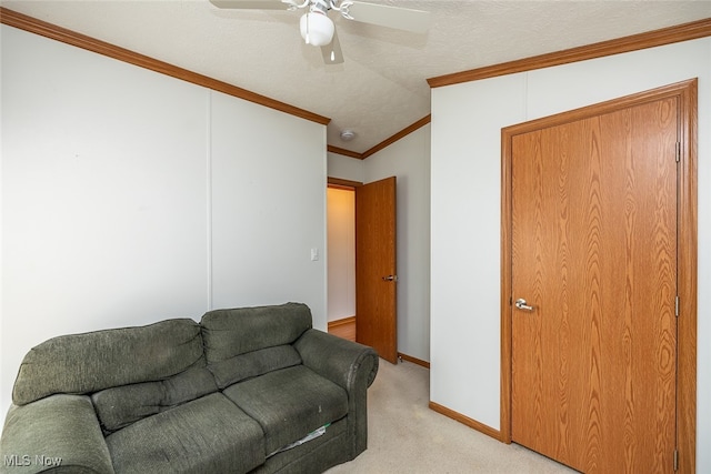 living room featuring crown molding, a textured ceiling, vaulted ceiling, light colored carpet, and ceiling fan