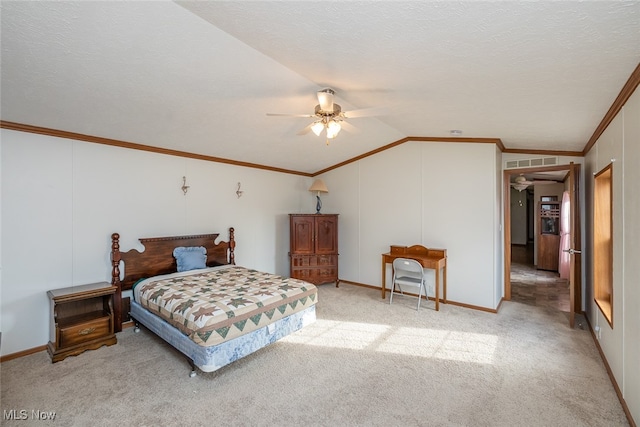 bedroom featuring a textured ceiling, vaulted ceiling, ceiling fan, and carpet floors