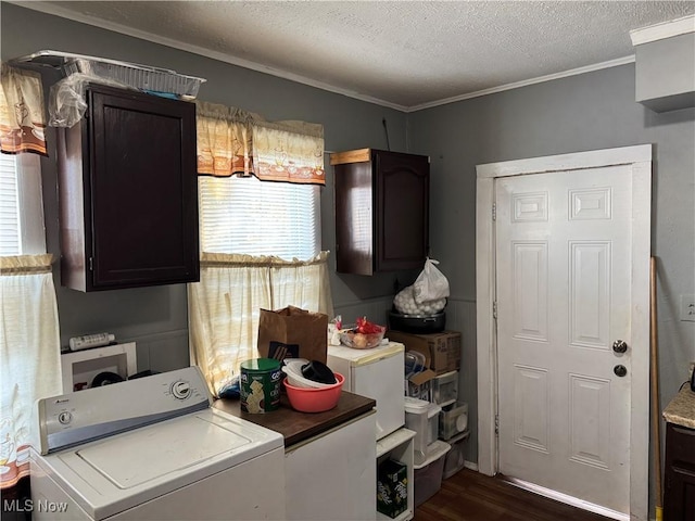 washroom with washer / clothes dryer, cabinet space, dark wood-style flooring, ornamental molding, and a textured ceiling