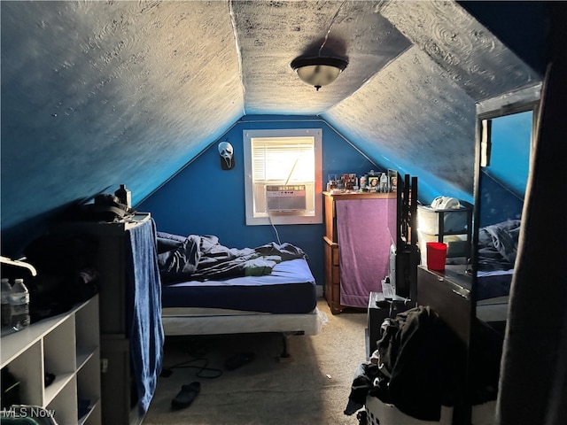 bedroom featuring cooling unit and lofted ceiling