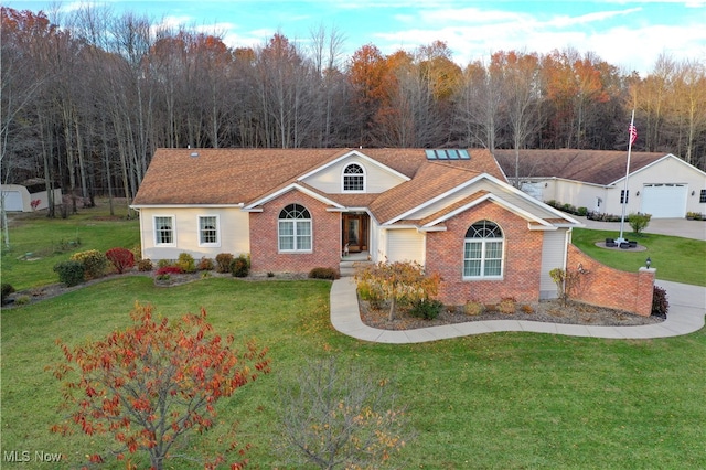 ranch-style home with a front yard